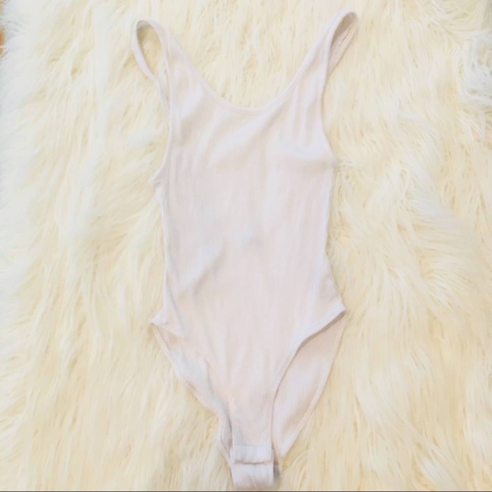 Scoop neck body suit.